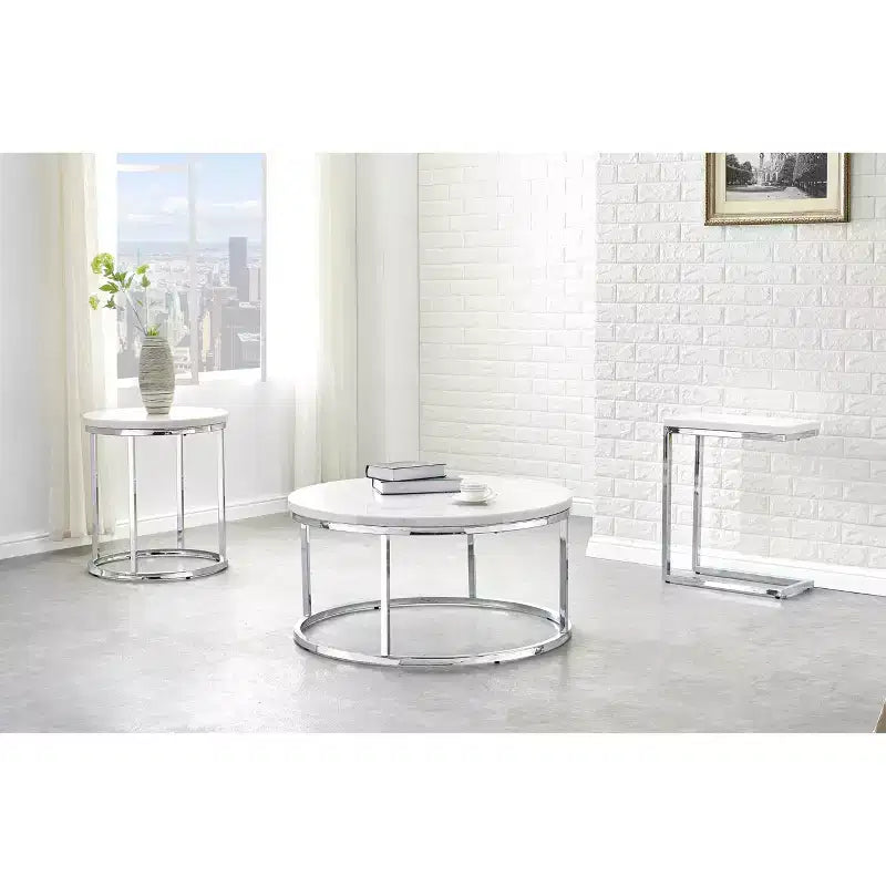 Tavolino rotondo da caffè – piano in marmo bianco, base cromata color argento, stile moderno