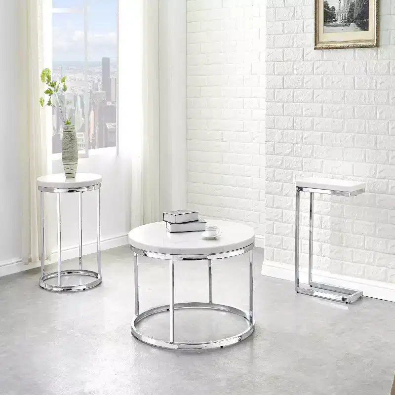 Tavolino rotondo da caffè – piano in marmo bianco, base cromata color argento, stile moderno